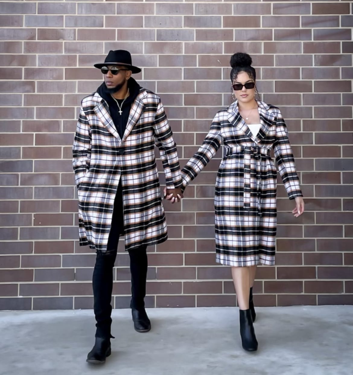 Couple wearing custom matching plaid coats by Lanell Designs